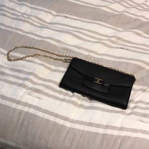 Tory Burch wallet on a chain